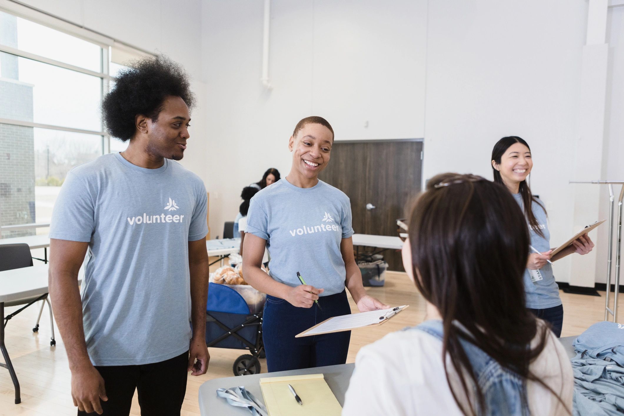 Volunteers registering participants at a community event