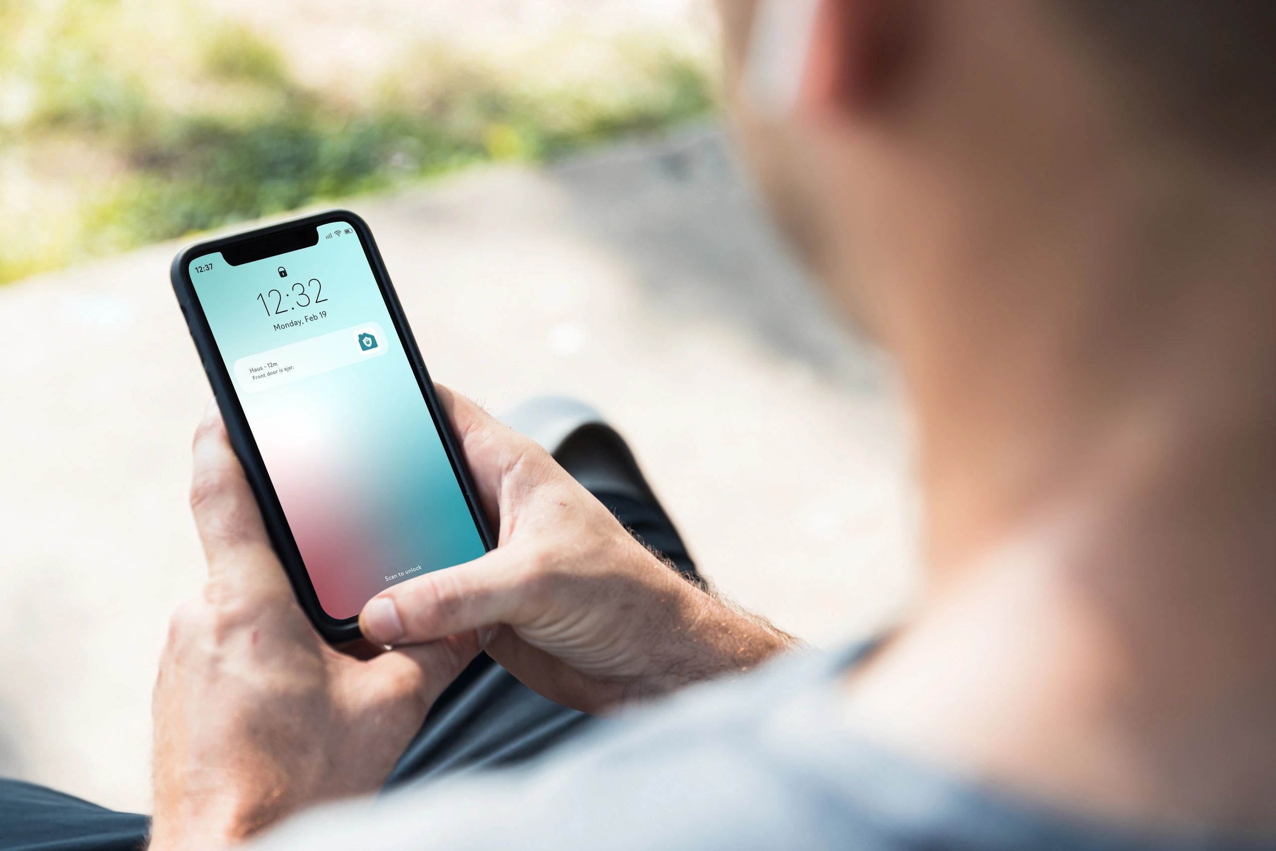 Person checking updates on a smartphone